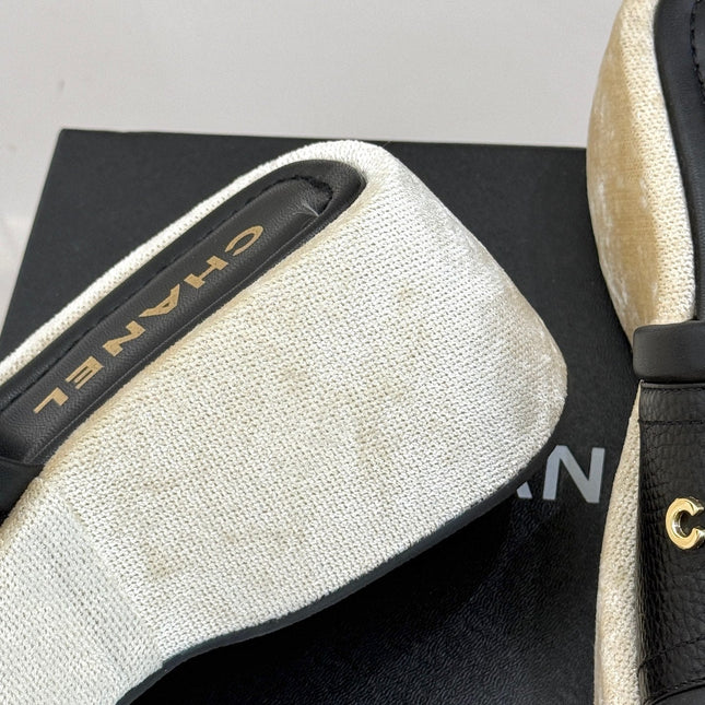 PLATFORM SLIPPERS IN BLACK LAMBSKIN