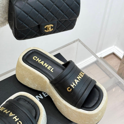 PLATFORM SLIPPERS IN BLACK LAMBSKIN