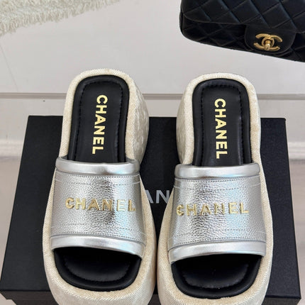 PLATFORM SLIPPERS IN SILVER LAMBSKIN