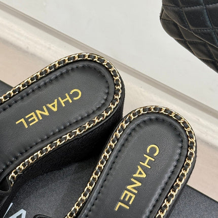 THICK SOLE WEDGE SLIPPERS IN BLACK CALFSKIN