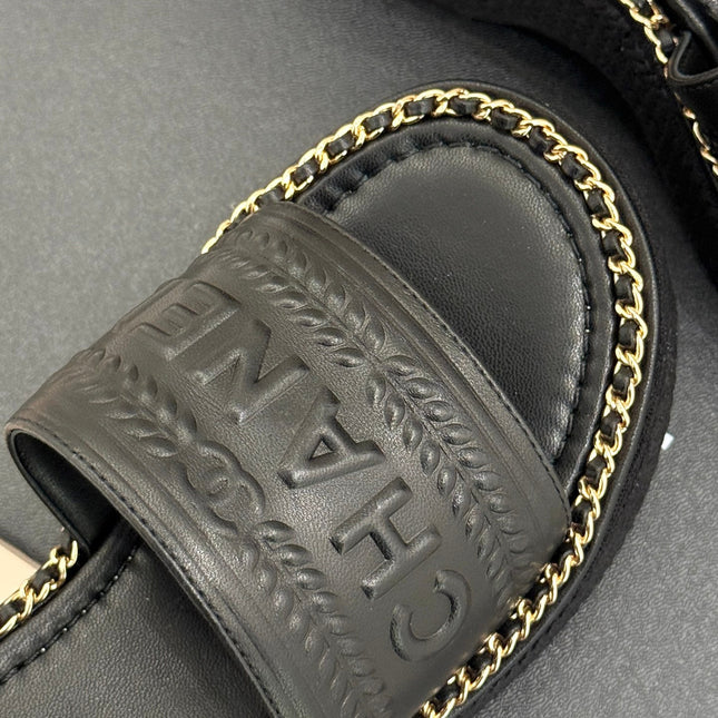 THICK SOLE WEDGE SLIPPERS IN BLACK CALFSKIN