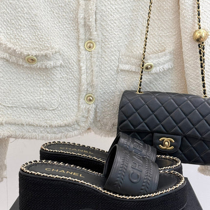 THICK SOLE WEDGE SLIPPERS IN BLACK CALFSKIN