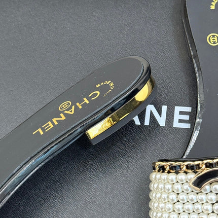 CC SLIDE SANDALS IN BLACK AND WHITE PEARL