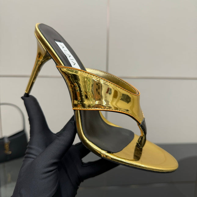 ALAIA HEELED THONG 25S IN GOLD PATENT LEATHER