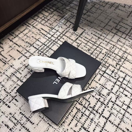 MID HEEL MULES IN WHITE SHEEPSKIN