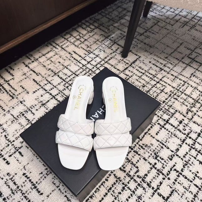 MID HEEL MULES IN WHITE SHEEPSKIN
