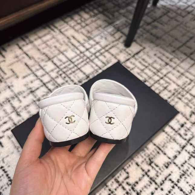 MID HEEL MULES IN WHITE SHEEPSKIN