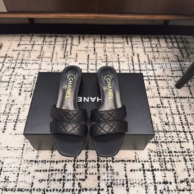 MID HEEL MULES IN BLACK SHEEPSKIN