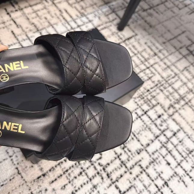 MID HEEL MULES IN BLACK SHEEPSKIN