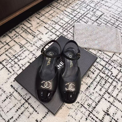 FLAT SLINGBACKS IN BLACK CALFSKIN