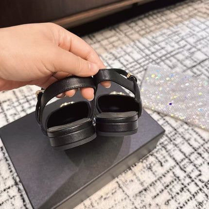 FLAT SLINGBACKS IN BLACK CALFSKIN