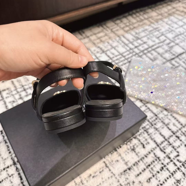 FLAT SLINGBACKS IN BLACK CALFSKIN