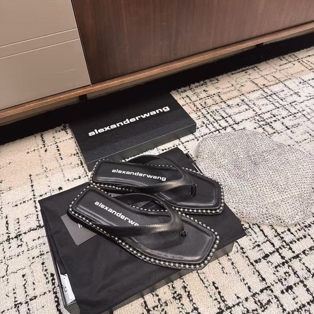 RHODES STUDDED THONG SANDAL IN BLACK CALFSKIN