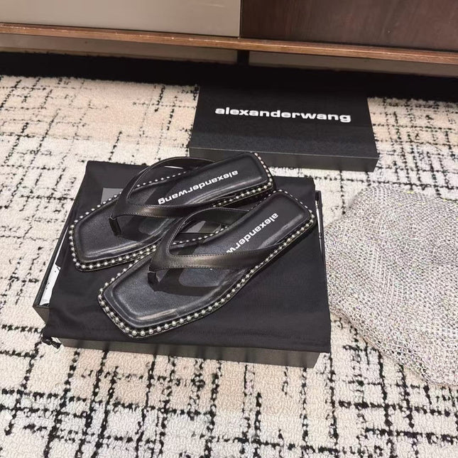 RHODES STUDDED THONG SANDAL IN BLACK CALFSKIN