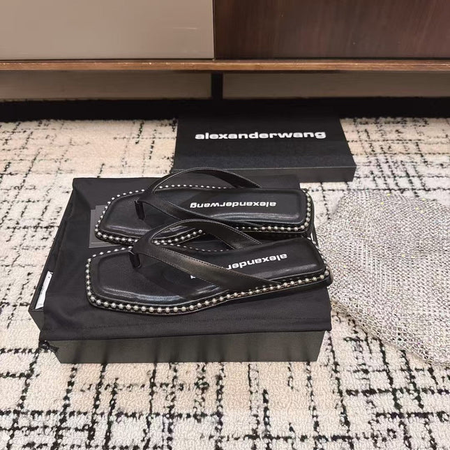 RHODES STUDDED THONG SANDAL IN BLACK CALFSKIN