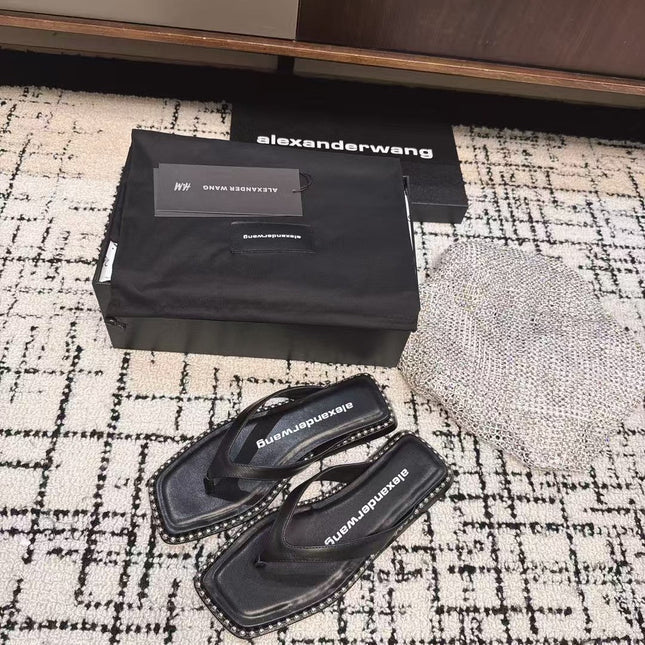 RHODES STUDDED THONG SANDAL IN BLACK CALFSKIN