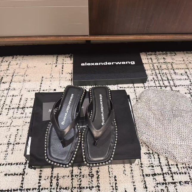 RHODES STUDDED THONG SANDAL IN BLACK CALFSKIN