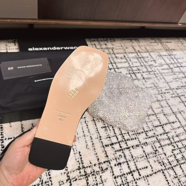 RHODES STUDDED THONG SANDAL IN BLACK CALFSKIN