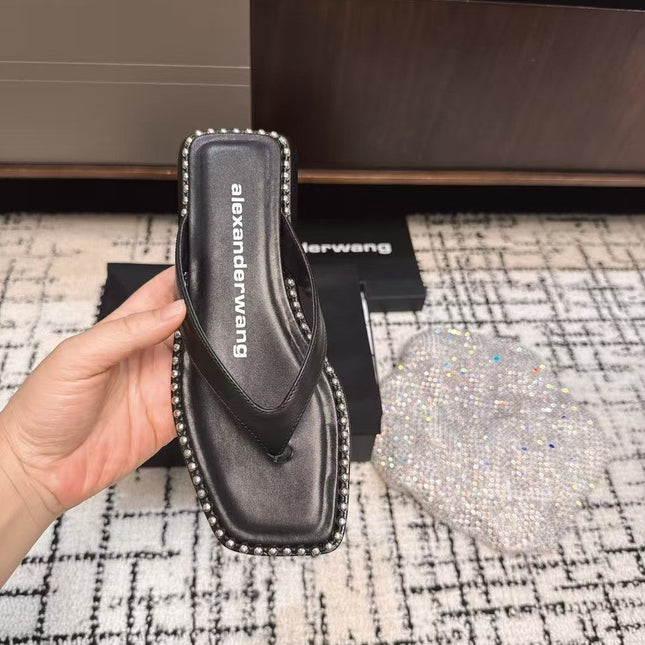 RHODES STUDDED THONG SANDAL IN BLACK CALFSKIN