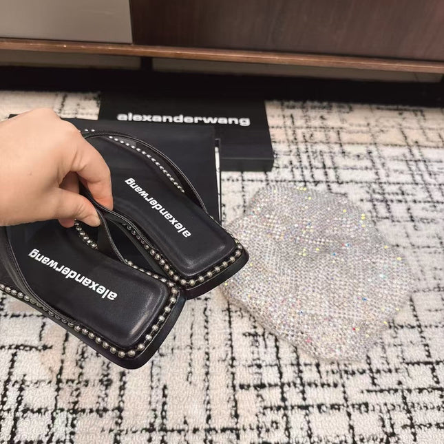 RHODES STUDDED THONG SANDAL IN BLACK CALFSKIN