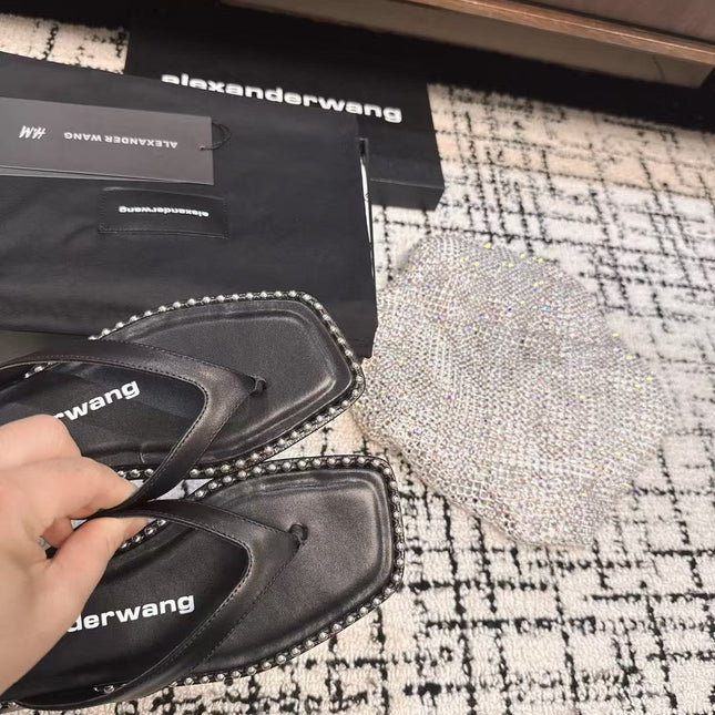 RHODES STUDDED THONG SANDAL IN BLACK CALFSKIN