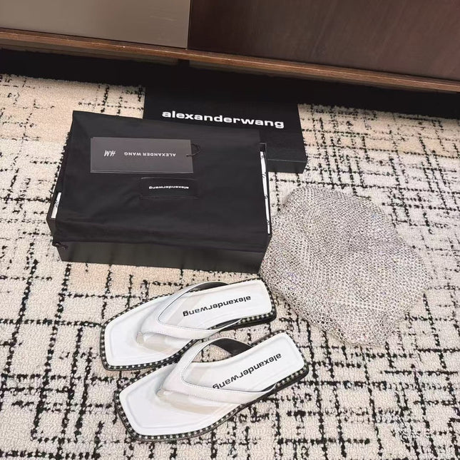 RHODES STUDDED THONG SANDAL IN WHITE CALFSKIN