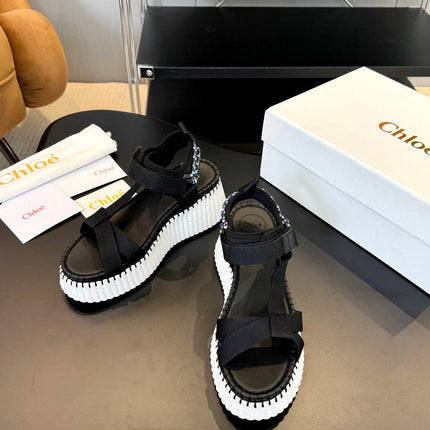 NAMA WEDGE SANDALS IN BLACK FABRIC AND WHITE RUBBER