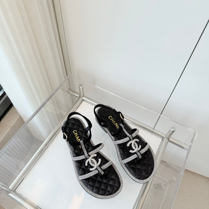 FLAT SANDALS IN BLACK SOFT LEATHER WITH SILVER STONE