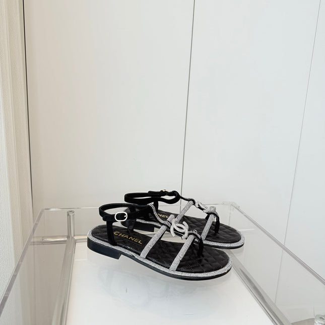 FLAT SANDALS IN BLACK SOFT LEATHER WITH SILVER STONE