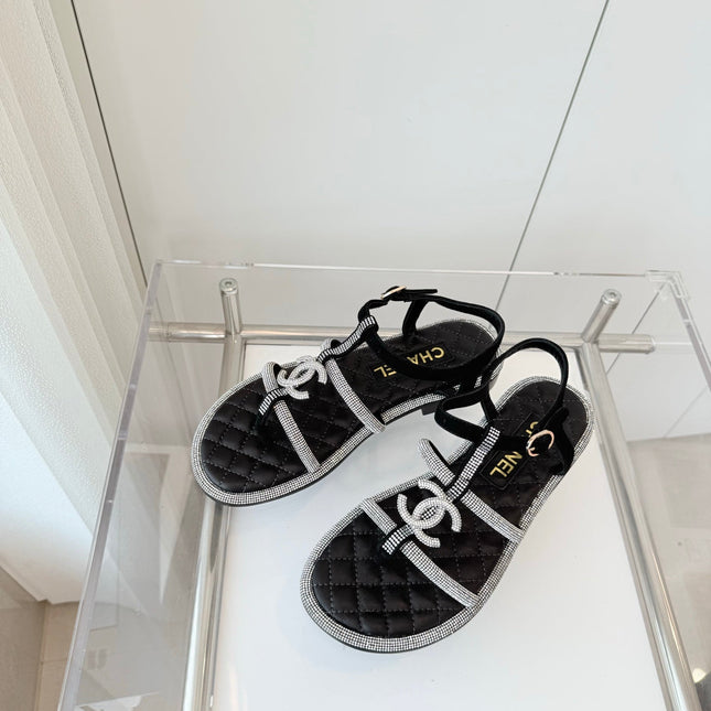 FLAT SANDALS IN BLACK SOFT LEATHER WITH SILVER STONE