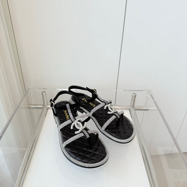 FLAT SANDALS IN BLACK SOFT LEATHER WITH SILVER STONE