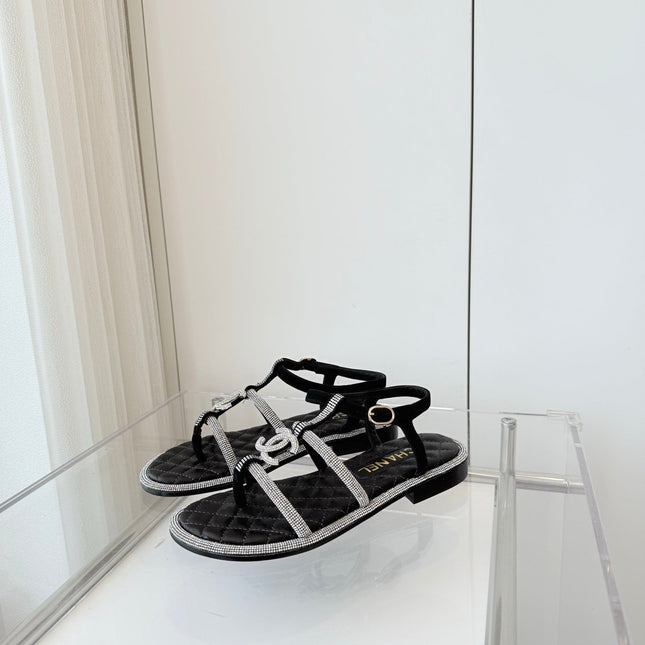 FLAT SANDALS IN BLACK SOFT LEATHER WITH SILVER STONE