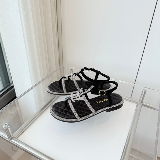 FLAT SANDALS IN BLACK SOFT LEATHER WITH SILVER STONE