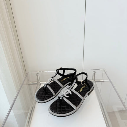 FLAT SANDALS IN BLACK SOFT LEATHER WITH SILVER STONE