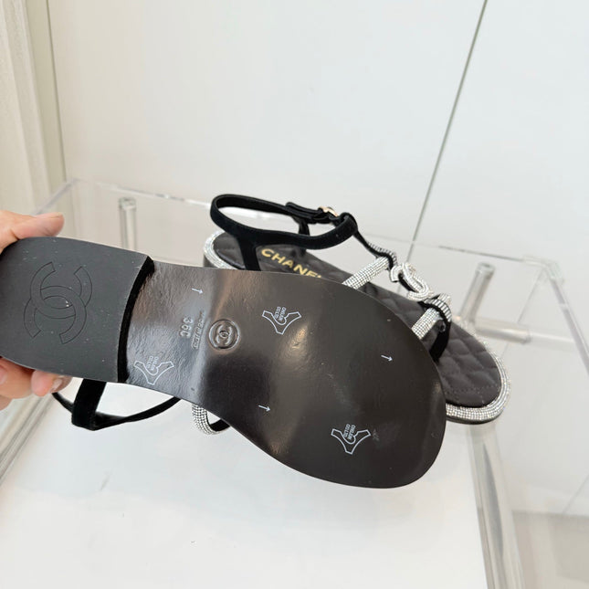 FLAT SANDALS IN BLACK SOFT LEATHER WITH SILVER STONE