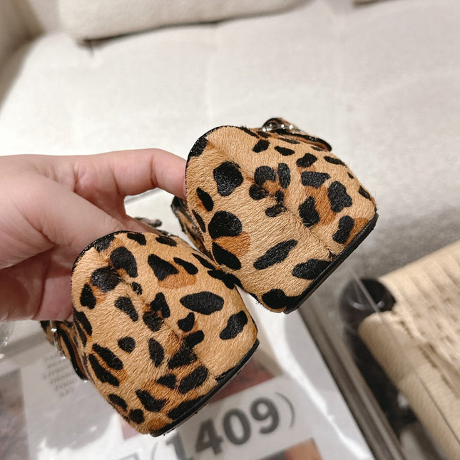 ALAIA 25S CRISS CROSS BALLET FLATS IN LEOPARD SUEDE