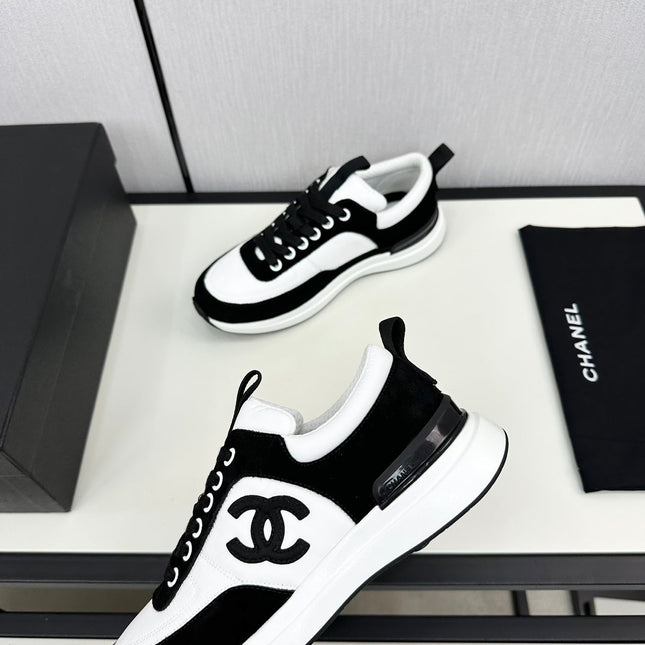 SNEAKER IN BLACK SUEDE AND WHITE CALFSKIN