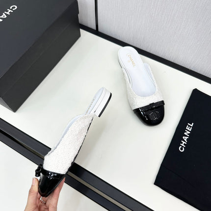 BOW MULE IN WHITE FUR AND BLACK CALFSKIN