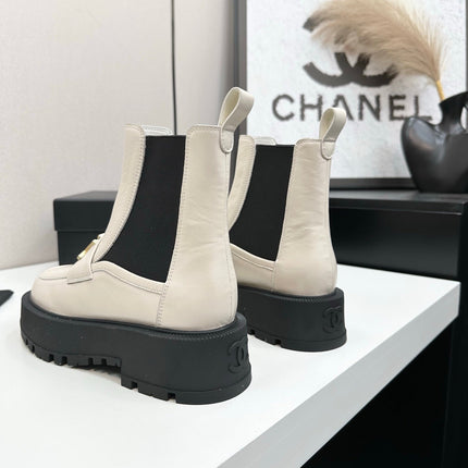 CHANEL 25S SHORT BOOTS IN WHITE CALFSKIN AND CANVAS