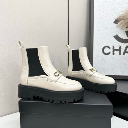 CHANEL 25S SHORT BOOTS IN WHITE CALFSKIN AND CANVAS