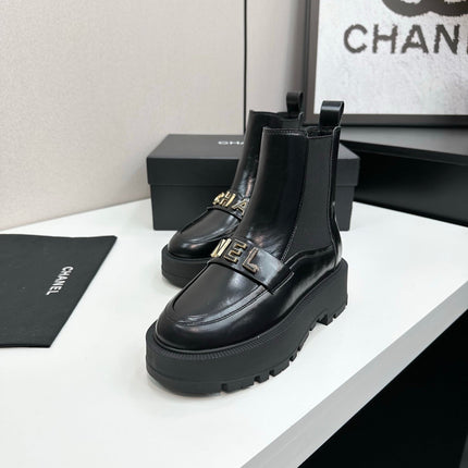 CHANEL 25S SHORT BOOTS IN BLACK CALFSKIN AND CANVAS