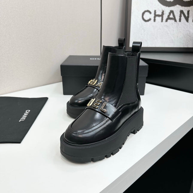 CHANEL 25S SHORT BOOTS IN BLACK CALFSKIN AND CANVAS