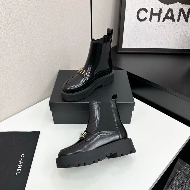 CHANEL 25S SHORT BOOTS IN BLACK CALFSKIN AND CANVAS