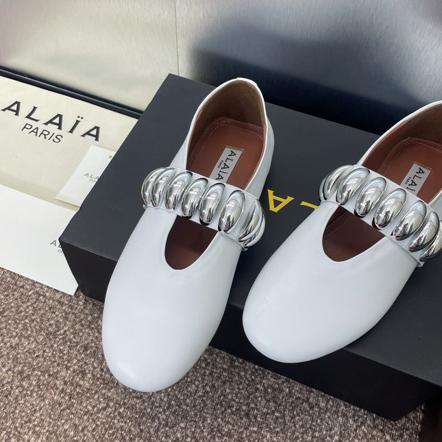 ALAIA MARY JANE FLATS 25S IN WHITE CALFSKIN WITH SILVER HARDWARE