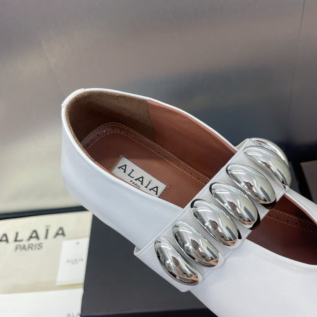 ALAIA MARY JANE FLATS 25S IN WHITE CALFSKIN WITH SILVER HARDWARE