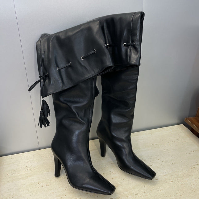 YSL 25S HIGH‑HEEL FRINGED MARTIN BOOTS 90 MM IN BLACK LAMBSKIN