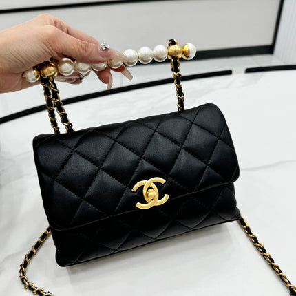 CHANEL 25S FLAP BAG 19 CM IN BLACK LAMBSKIN WITH PEARL TOP HANDLE
