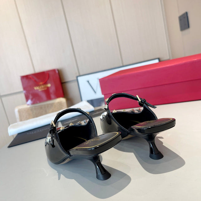 ROCKSTUD CAGED MULES 5 CM IN BLACK CALFSKIN