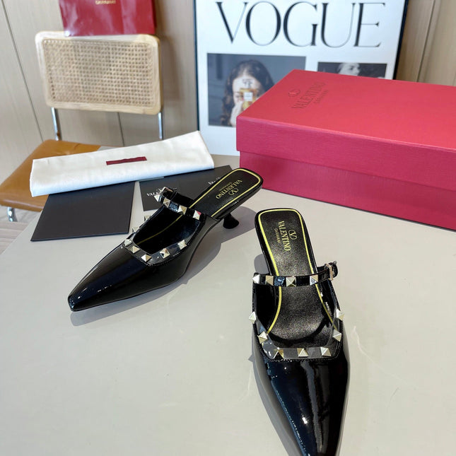 ROCKSTUD CAGED MULES 5 CM IN BLACK CALFSKIN