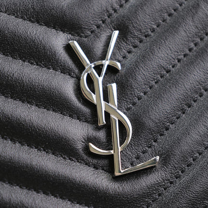 CLUTCH 36 IN BLACK QUILTED CALFSKIN SILVER BUCKLE